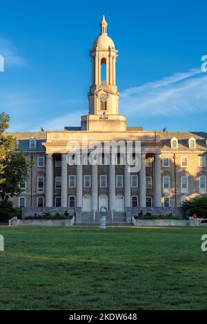 The Old Main building at Sunrise on the campus of Penn State University in State College, Pennsylvania. Stock Photo