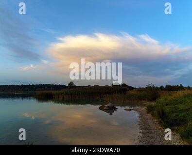 Beautiful clouds in the sky over the quarry . Leningrad region. Vsevolozhsk Stock Photo
