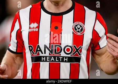 Sheffield, UK. 08th Nov, 2022. A poppy on the match day shirts during the Sky Bet Championship match Sheffield United vs Rotherham United at Bramall Lane, Sheffield, United Kingdom, 8th November 2022 (Photo by Ben Early/News Images) in Sheffield, United Kingdom on 11/8/2022. (Photo by Ben Early/News Images/Sipa USA) Credit: Sipa USA/Alamy Live News Stock Photo