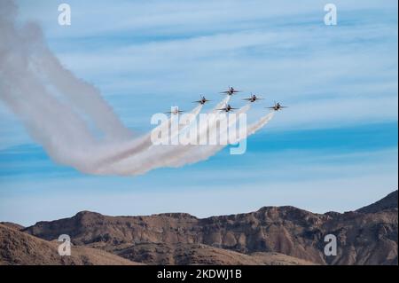 Six F-16 Fighting Falcon fighter jets assigned to the U.S. Air Force Air Demonstration Squadron “Thunderbirds” perform the Delta formation during the Aviation Nation 2022 air show at Nellis Air Force Base, Nevada, Nov. 5, 2022. The Thunderbirds squadron is an Air Combat Command unit composed of eight pilots, four support officers, three civilians and more than 130 enlisted personnel performing in 25 career fields. (U.S. Air Force photo by William R. Lewis) Stock Photo