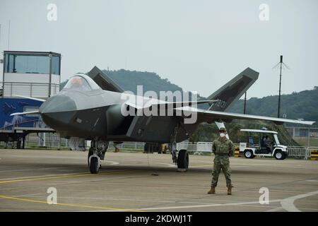 ZHUHAI, CHINA - NOVEMBER 8, 2022 - The Chengdu J-20 stealth fighter jet is on static display at the Airshow China in Zhuhai, Guangdong province, China Stock Photo