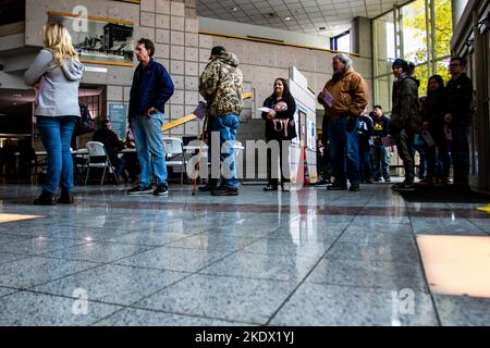 Reno, United States. 08th Nov, 2022. Voters wait in a line to vote. Election day in Northern Nevada is met with a winter storm but turn remained busy for in person voting. Along side local elections the state will also vote on a Senator position and State Governor. Credit: SOPA Images Limited/Alamy Live News Stock Photo