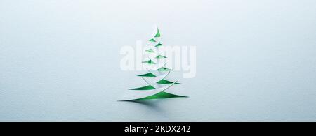 Christmas tree cut from blue and green textured paper Stock Photo