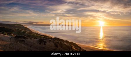 Sunset panorama over Monterey Bay from the sand dunes in Marina Stock Photo