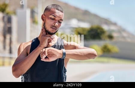 Fitness, runner or black man checking pulse on smartwatch for training time, wellness goal or workout on tracker app. Athlete, jogger or man for watch Stock Photo