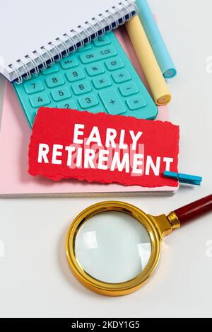 Sign displaying Early Retirement, Word Written on practice of leaving employment before the statutory age Stock Photo