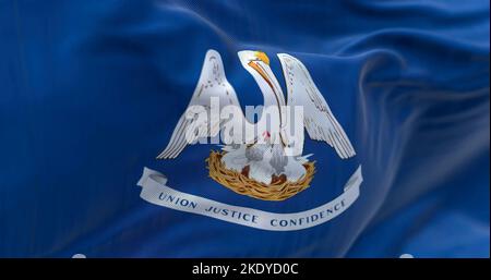 Close-up view of the Louisiana state flag waving in the wind. Louisiana is a federated state of the United States of America. Fabric textured backgrou Stock Photo