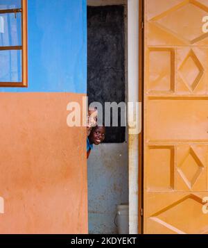 Happy smiling children at the classroom door of a school in the Sagalla region of Kenya near Voi East Africa Stock Photo