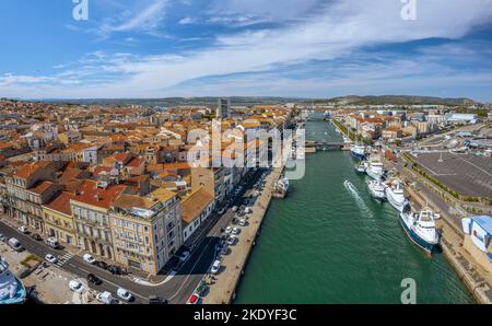 The drone aerial view of royal canal in Sète, Occitanie, France. Sète is a port and a seaside resort. It is on the Mediterranean. Stock Photo