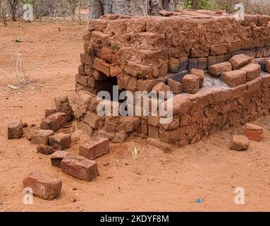 Primitive kiln used to fire bricks made from compressed earth and clay in Voi Southern Kenya Stock Photo