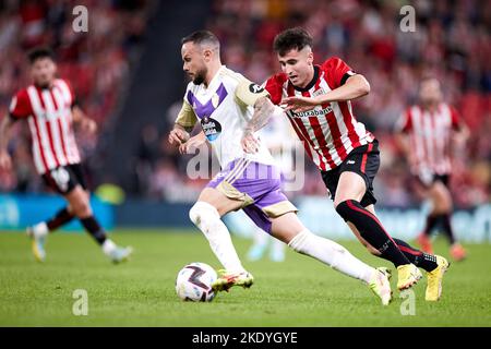 Ivan Sanchez of Real Valladolid CF competes for the ball with Jon Morcillo of Athletic Club during the Spanish championship La Liga football match between Athletic Club and Real Valladolid CF on November 8, 2022 at San Mames stadium in Bilbao, Spain - Photo: Ricardo Larreina/DPPI/LiveMedia Stock Photo