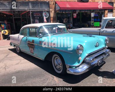 A beautiful classic blue Chevrolet Bel Air on the road during a car show in Williams Stock Photo