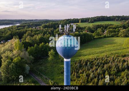 Old water tower with cell site in Terlicko village, municipality in Karvina District in the Moravian-Silesian Region of the Czech Republic Stock Photo