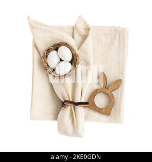 Easter design with eggs bunny ears and napkins on white Stock Photo
