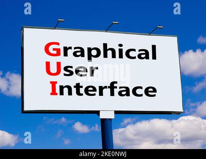 GUI graphical user interface symbol. Concept words GUI graphical user interface on billboard on a beautiful blu sky background. Business and GUI graph Stock Photo