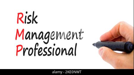 RMP risk management professional symbol. Concept words RMP risk management professional on a beautiful white background. Businessman hand. Business RM Stock Photo