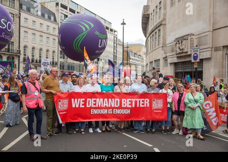 Participants gather and march during ‘We demand better’ demonstration called by the TUC amid the rising cost of living in London. Stock Photo