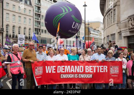 Participants gather and march during ‘We demand better’ demonstration called by the TUC amid the rising cost of living in London. Stock Photo