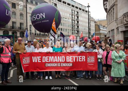 Participants gather and march during ‘We demand better’ demonstration called by the TUC amid the rising cost of living in London. Stock Photo