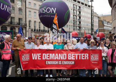 Participants gather and march during ‘We demand better’ demonstration called by the TUC amid the rising cost of living in London. Stock Photo