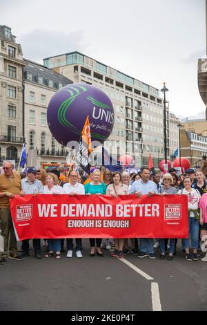 Participants gather and march during ‘We demand better’ demonstration called by the TUC amid the rising cost of living in London. Stock Photo