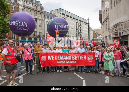 Participants gather and march during ‘We demand better’ demonstration called by the TUC amid the rising cost of living in London. Stock Photo