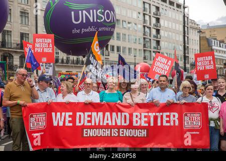 Participants gather and march during ‘We demand better’ demonstration called by the TUC amid the rising cost of living in London. Stock Photo