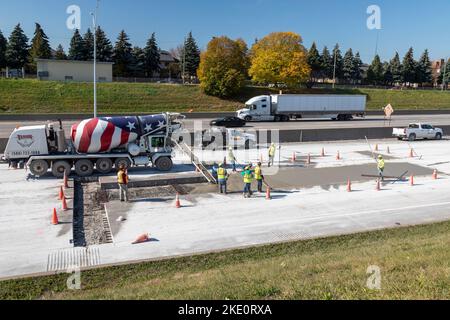 Detroit, Michigan - Workers repair and patch the concrete on Interstate 75. Stock Photo