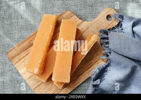 Jaggery traditional cane sugar cube on table  Stock Photo