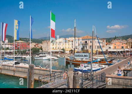 Lake Garda Bardolino, view in summer of the Lungolago Francesco Lenotti - the colorful lakeside harbour area in Bardolino, Lake Garda, Veneto, Italy Stock Photo