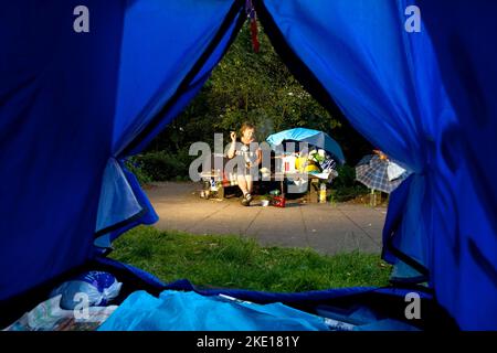 Irena B., who has been homeless for years, has pitched her tent in the Old Elbe Park near the Bismarck Monument. Stock Photo