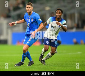 23 Oct 2022 - Italy v England - UEFA Nations League - Group 3 - San Siro  23 Oct 2022 - Italy v England - UEFA Nations League.         England's Raheem Sterling and Jorginho during the UEFA Nations League match against Italy. Picture : Mark Pain / Alamy Stock Photo