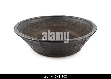 Black empty earthen vessel isolated on white background. Traditional clay pot  bowl isolated Stock Photo