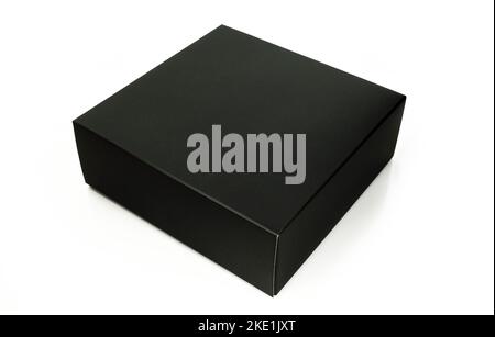 Blank black carton box isolated on white background. Closed Stock Photo