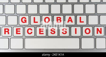 Global recession on computer keyboard Stock Photo