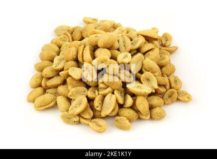 Pile of oregano and salt seasoned peanuts isolated on white background Stock Photo