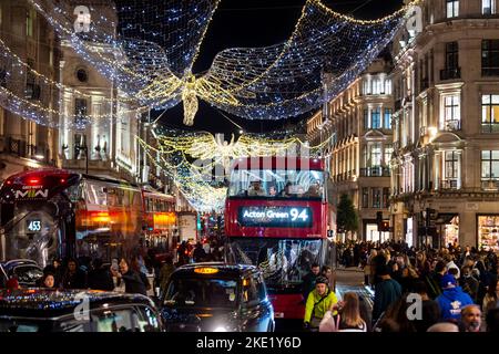 London, UK.  9 November 2022.  Christmas lights in Regent Street are switched on.  Rather than a traditional annual lighting-up event attended by large crowds, organisers have opted for a low key switch on with restricted hours of operation (3pm to 11pm), rather than 24 hours in previous years.  Credit: Stephen Chung / Alamy Live News Stock Photo