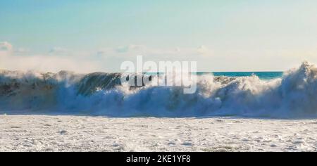 Extremely huge big surfer waves on the beach in Zicatela Puerto Escondido Oaxaca Mexico. Stock Photo