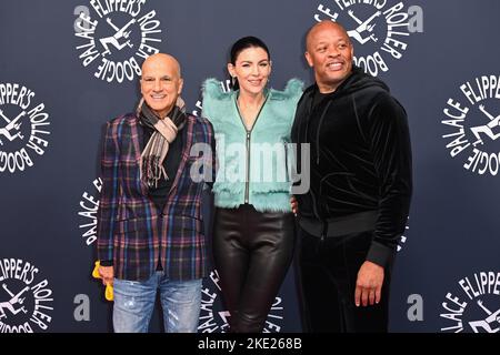 London, UK. 9 November 2022. (l-r) Jimmy Lovine, Liberty Ross and Dr Dre attending the opening of Flipper's Roller Boogie Palace in west London. Picture date: Wednesday November 9, 2022. Photo credit should read: Matt Crossick/Empics/Alamy Live News Stock Photo
