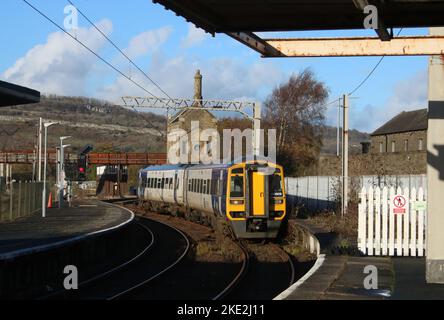 Northern trains express sprinter diesel multiple unit arriving at Carnforth railway station on 9th November 2022 with ordinary passenger service. Stock Photo