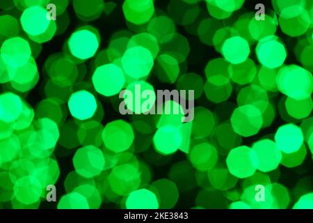 Defocused christmas green abstract bokeh lights background. Festive lights. Blurred holiday bokeh. Stock Photo