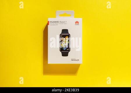 Tyumen, Russia-September 27, 2022: Huawei new smart watch Huawei Band 7. Yellow Background Stock Photo