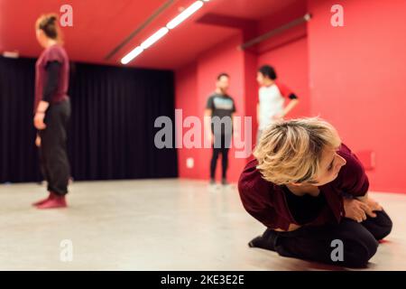 theater students doing floor exercises Stock Photo
