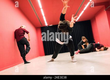 theater students doing floor exercises and stretching Stock Photo