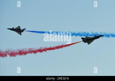 ZHUHAI, CHINA - NOVEMBER 10, 2022 - The 'August 1st' aerobatic team of China's Air Force performs during the Airshow China in Zhuhai, Guangdong provin Stock Photo