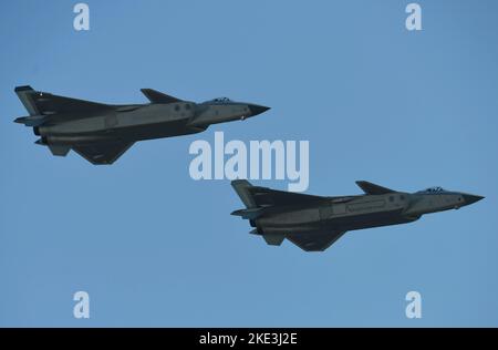 ZHUHAI, CHINA - NOVEMBER 10, 2022 - Chengdu J-20  performs a two-plane flight demonstration at the Airshow China in Zhuhai, Guangdong province, China, Stock Photo