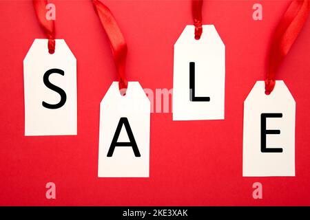 White price tags on red with soft shadow, clipping path included Stock Photo