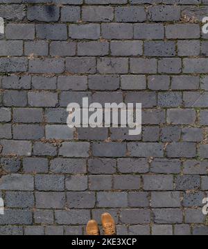 Old paving slabs with shoes Stock Photo