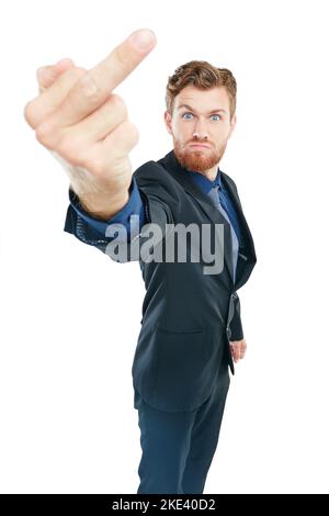 Whatcha looking at. Studio portrait of a young businessman showing the middle finger against a white background. Stock Photo