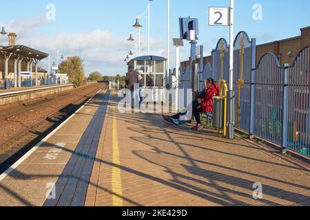 Passengers waiting on a railway platform in Mansfield, Nottingham, UK Stock Photo